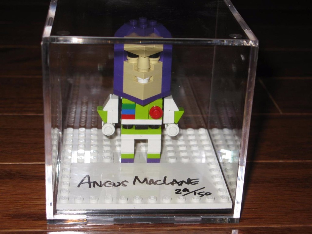 LEGO CUBE DUDE BUZZ LIGHTYEAR FIGURE 2010 TOY FAIR SIGNED BY ANGUS MACLANE # 29 Front