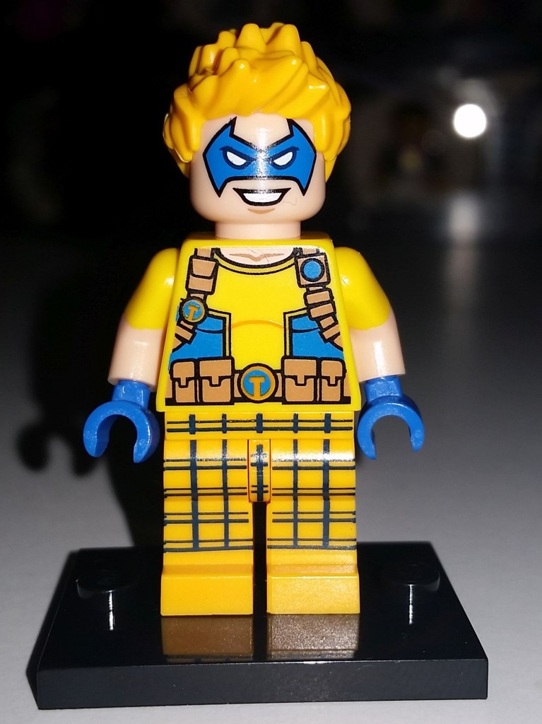 DC Comics Super Heroes Justice League - Trickster Minifigure Exclusive on stand front - Copy
